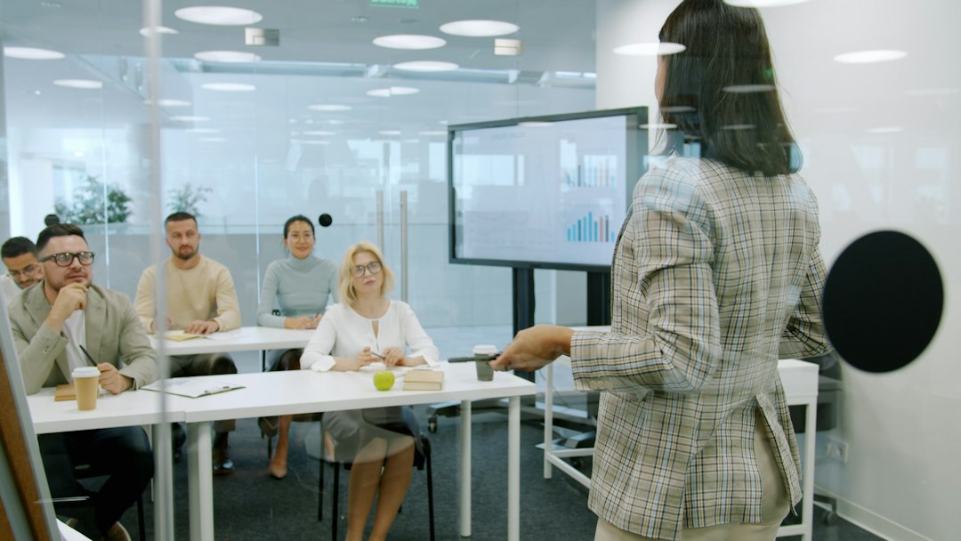 Professional facilitator leading a diverse employee development session